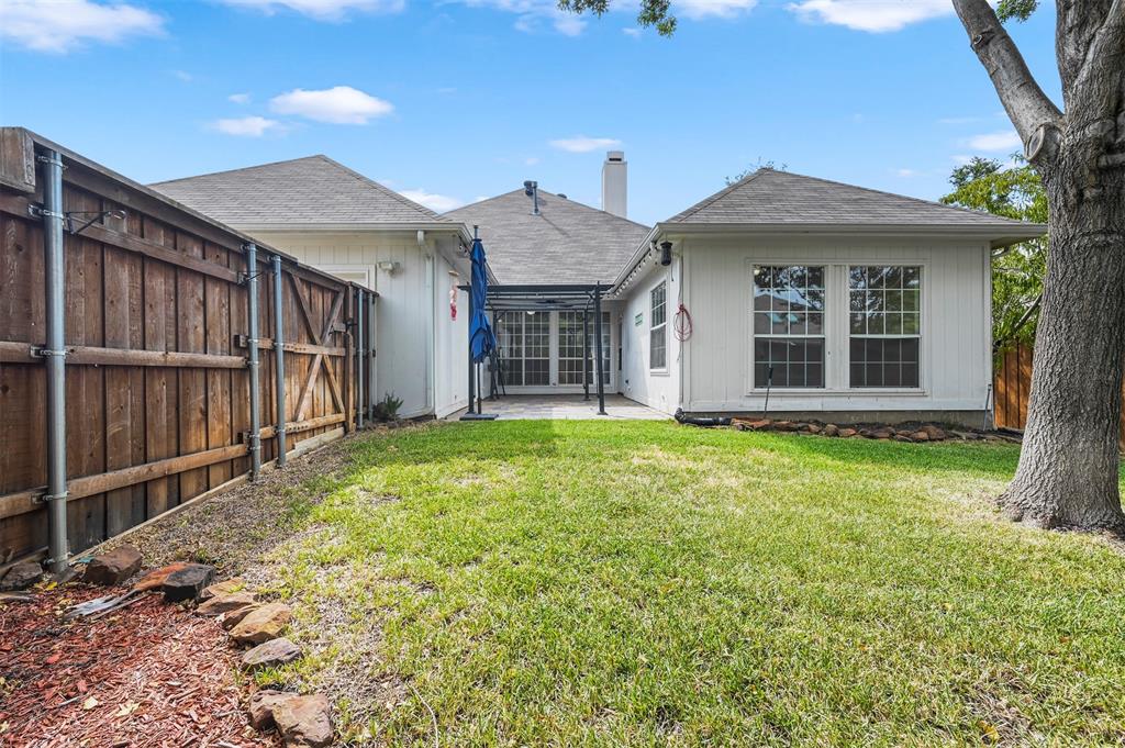 4524 Ridgepointe Drive The Colony, TX 75056 - Photo 23 of 25 front view of a house with a yard