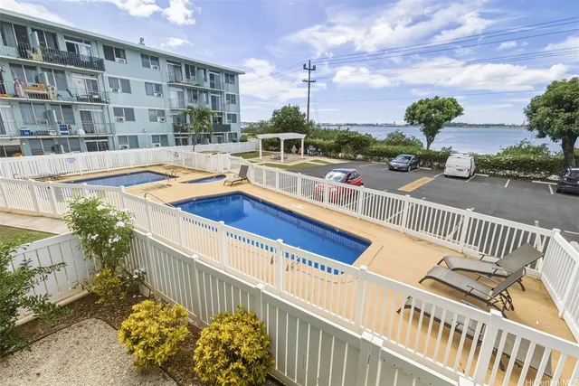 a view of balcony with a potted plant