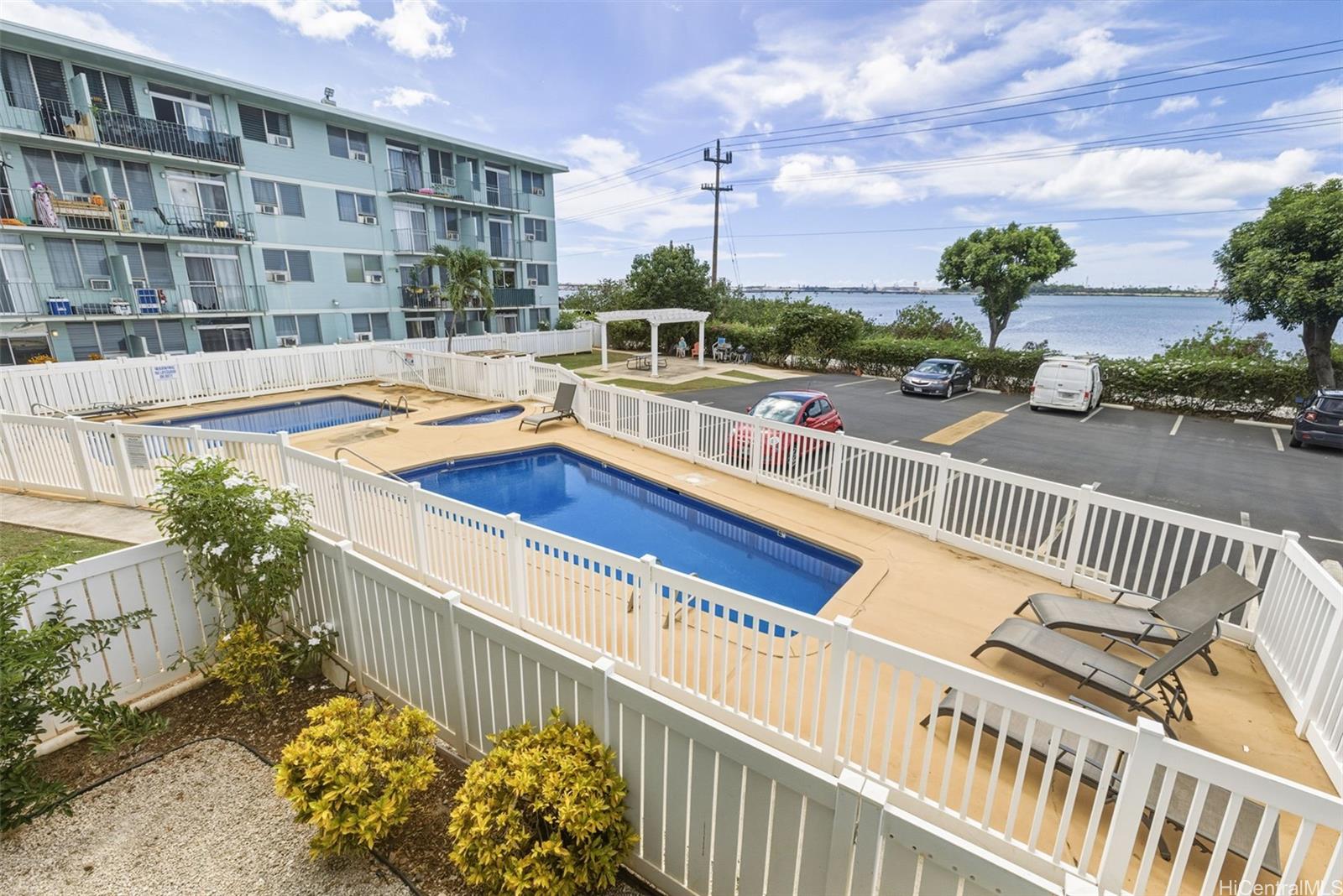 98-135 Lipoa Place, Unit 208 Aiea, HI 96701 - Photo 20 of 22 a view of balcony with a potted plant