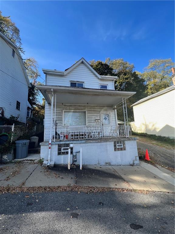 433 Henry Street McKees Rocks, PA 15136 - Photo 1 of 25 a front view of a house with a yard