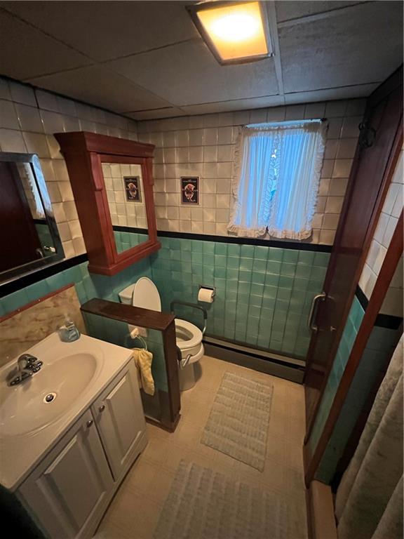 433 Henry Street McKees Rocks, PA 15136 - Photo 17 of 25 a bathroom with a sink and mirror