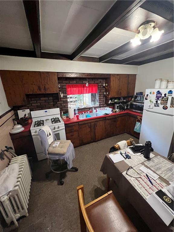 433 Henry Street McKees Rocks, PA 15136 - Photo 10 of 25 a room with furniture and a flat screen tv