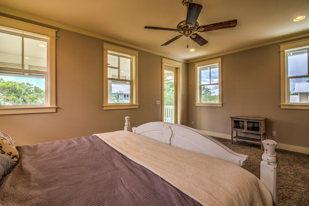 59 Pontchartrain North Santa Rosa Beach, FL 32459 - Photo 23 of 43 a bedroom with a bed dresser and a window