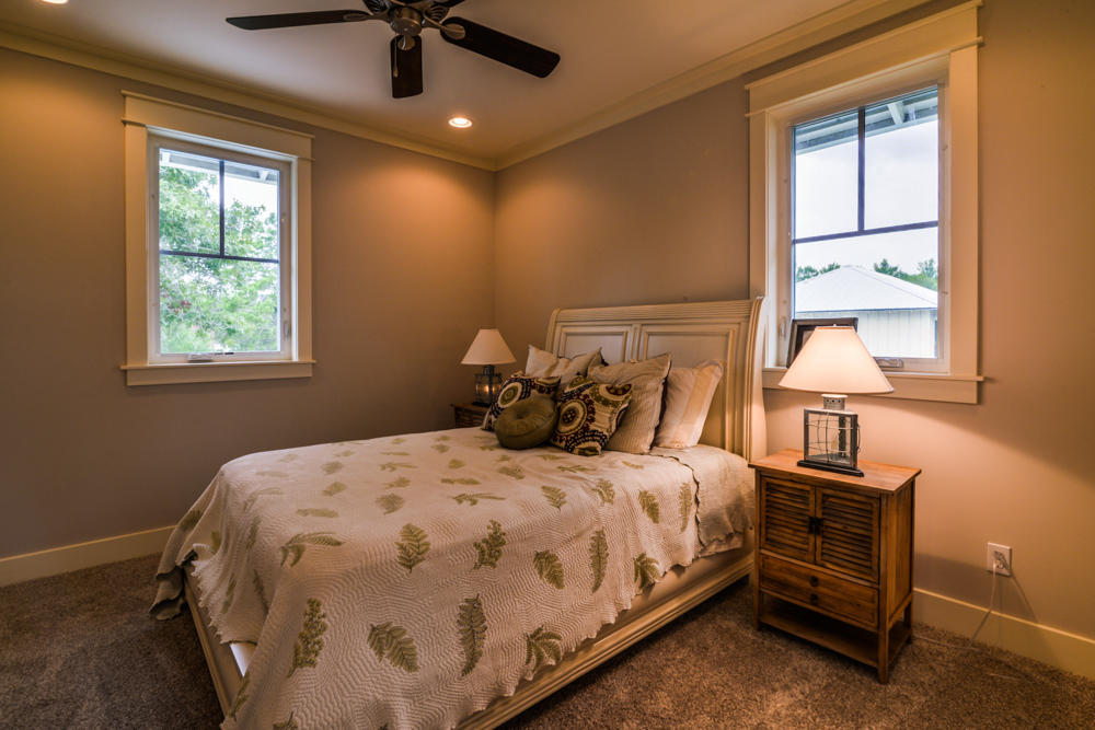 59 Pontchartrain North Santa Rosa Beach, FL 32459 - Photo 28 of 43 a bedroom with a bed and window