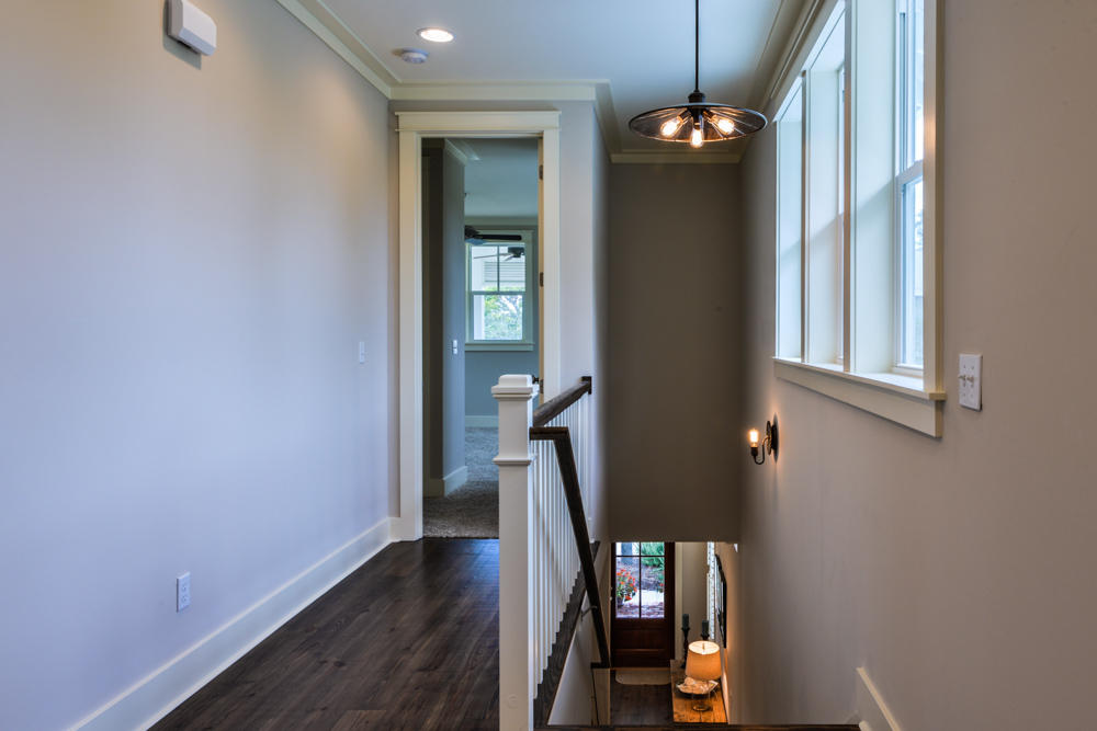 59 Pontchartrain North Santa Rosa Beach, FL 32459 - Photo 32 of 43 a view of a hallway with wooden floor and stairs