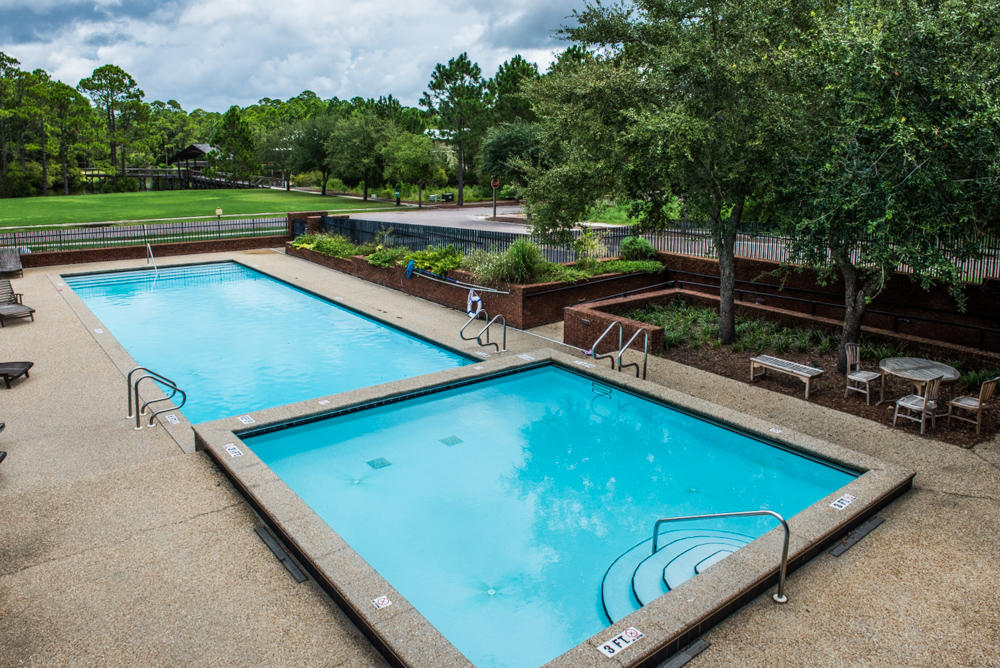 59 Pontchartrain North Santa Rosa Beach, FL 32459 - Photo 35 of 43 a view of a backyard with a chair and a table