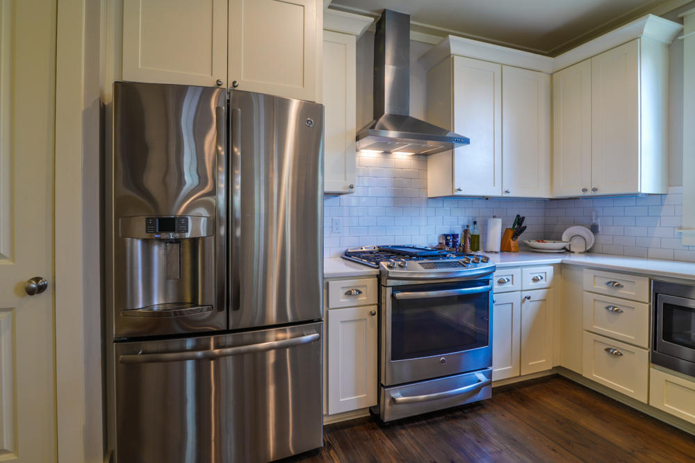 59 Pontchartrain North Santa Rosa Beach, FL 32459 - Photo 10 of 43 a kitchen with stainless steel appliances granite countertop a refrigerator stove and sink