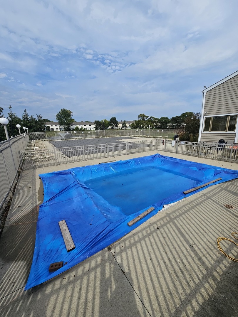 608 Bayview Point Schaumburg, IL 60194 - Photo 31 of 31 a view of a lake with houses in the back