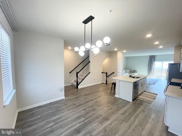 8804 Woodyard Station Road Clinton, MD 20735 - Photo 17 of 39 a view of a dining room with wooden floor