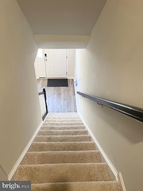 8804 Woodyard Station Road Clinton, MD 20735 - Photo 20 of 39 a view of entryway and hall with wooden floor