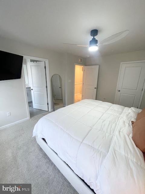 8804 Woodyard Station Road Clinton, MD 20735 - Photo 23 of 39 a bedroom with a bed and a flat screen tv