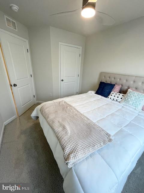 8804 Woodyard Station Road Clinton, MD 20735 - Photo 28 of 39 a bedroom with a bed and a dresser