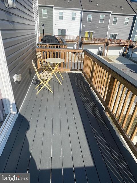 8804 Woodyard Station Road Clinton, MD 20735 - Photo 35 of 39 a view of balcony patio and outdoor seating