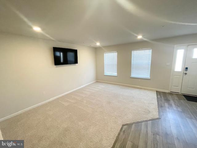 8804 Woodyard Station Road Clinton, MD 20735 - Photo 4 of 39 an empty room with windows and television