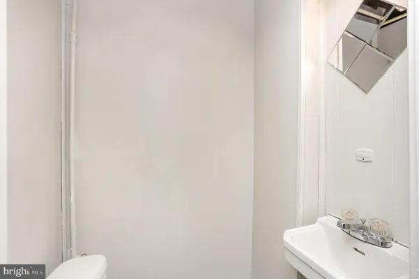 a bathroom with a sink and a toilet