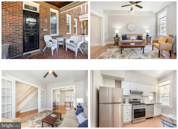 a living room with furniture and a kitchen view