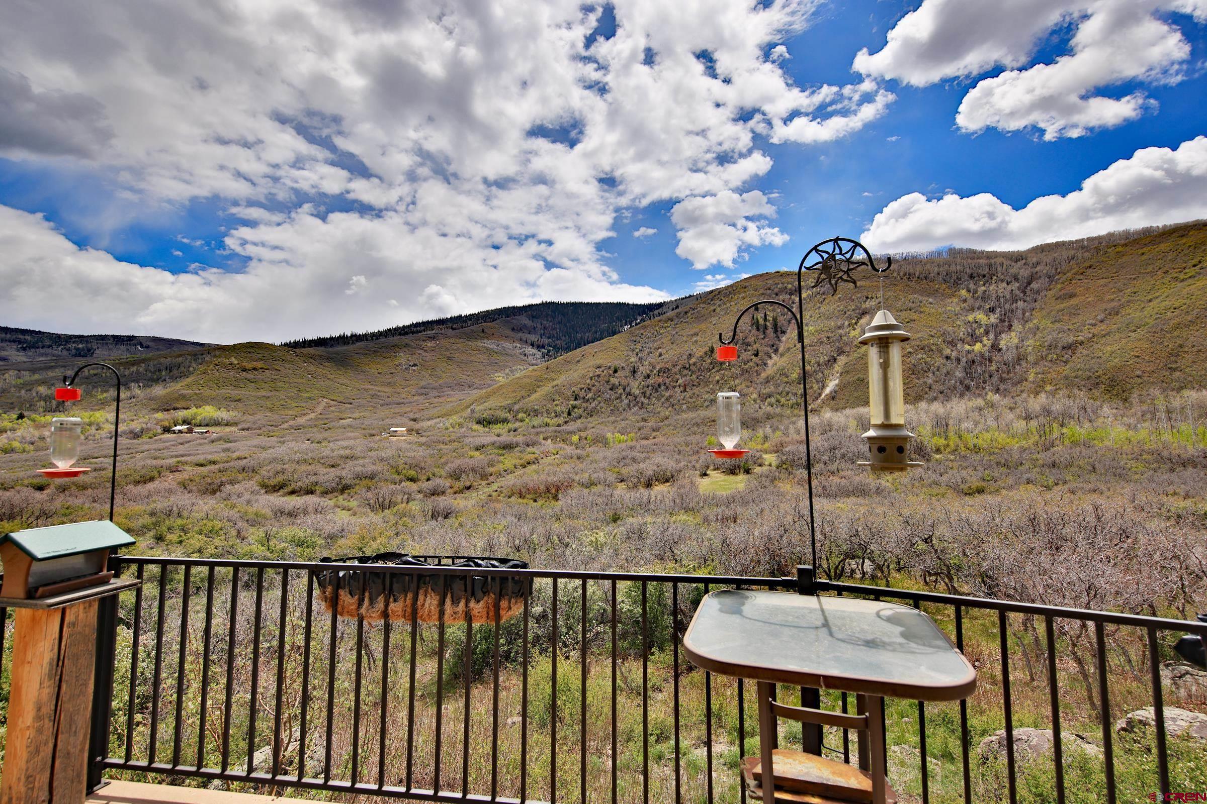 53315 Bull Basin Road Mesa, CO 81643 - Photo 35 of 44 a view of a terrace with sky view