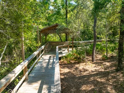 a view of a yard from a balcony