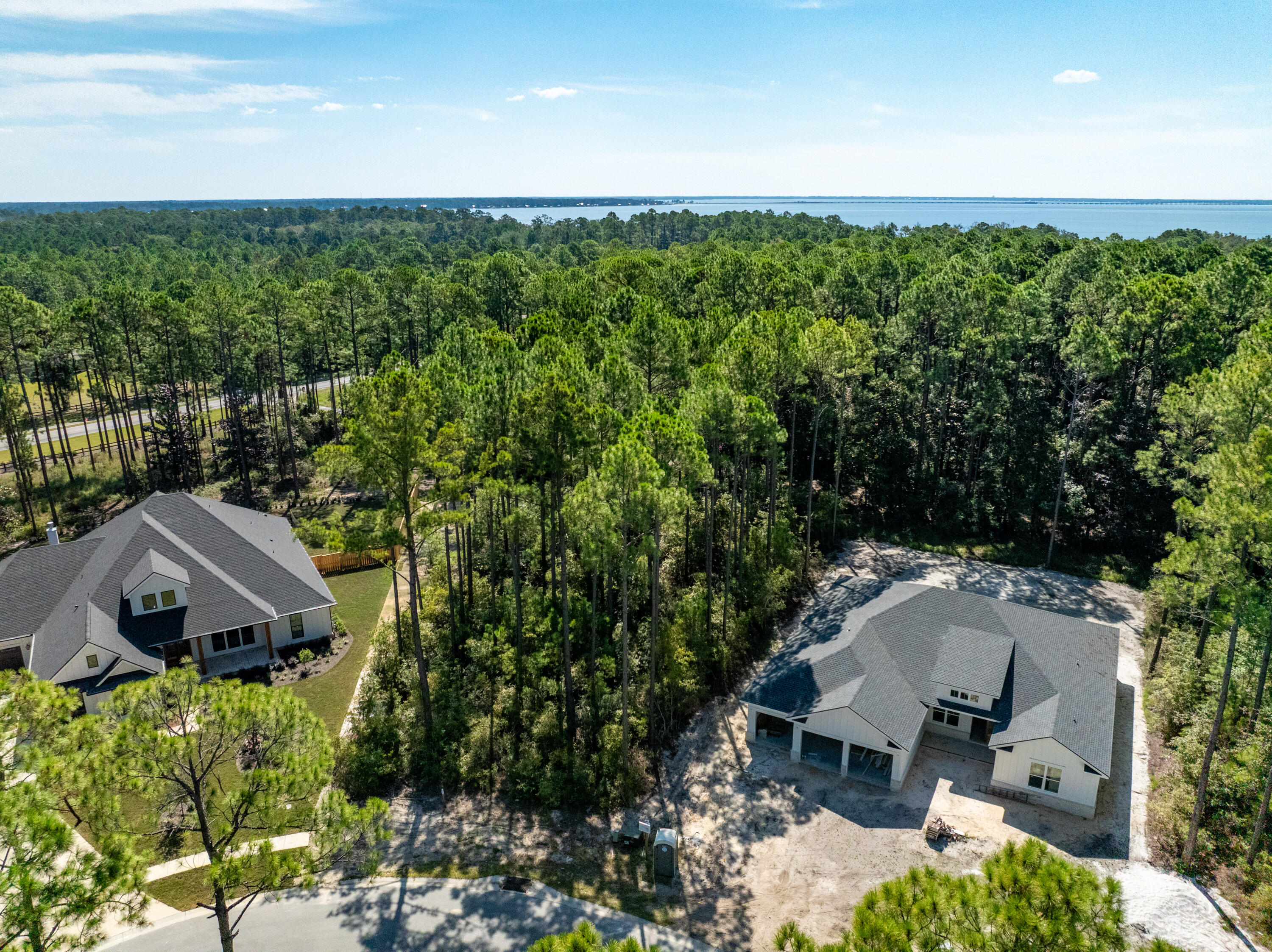 Lot 37 East Captain Fritz Way Freeport, FL 32439 - Photo 30 of 34 an aerial view of a house with yard and outdoor seating