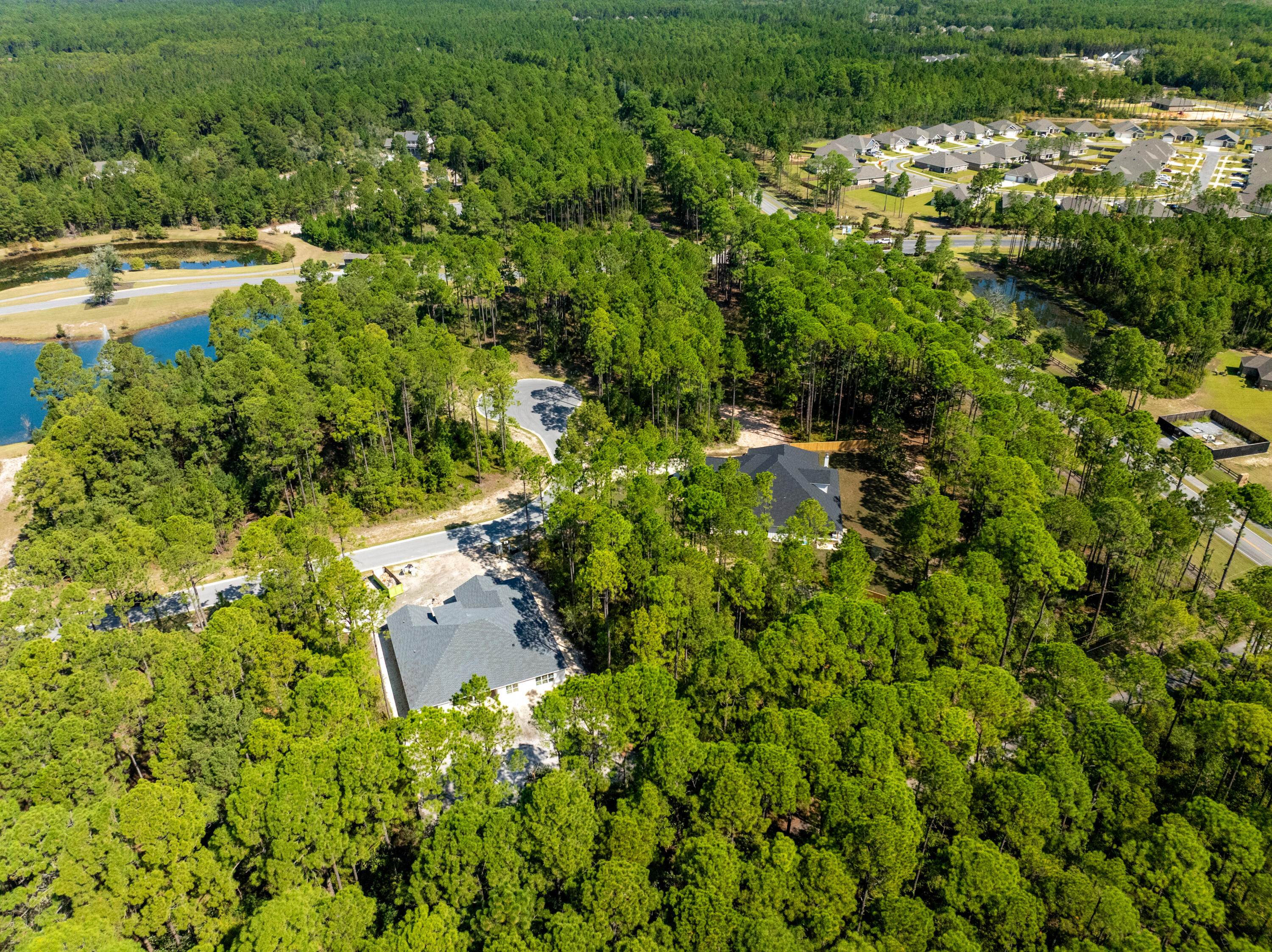 Lot 37 East Captain Fritz Way Freeport, FL 32439 - Photo 34 of 34 an aerial view of residential house with outdoor space and trees all around