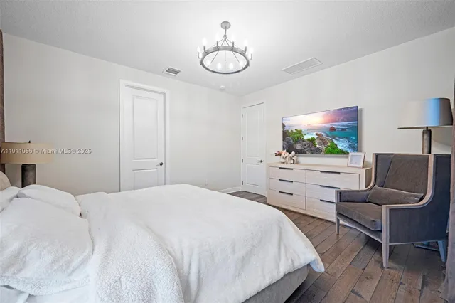 a bedroom with a bed and furniture