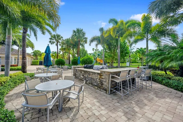 a view of a swimming pool and a yard