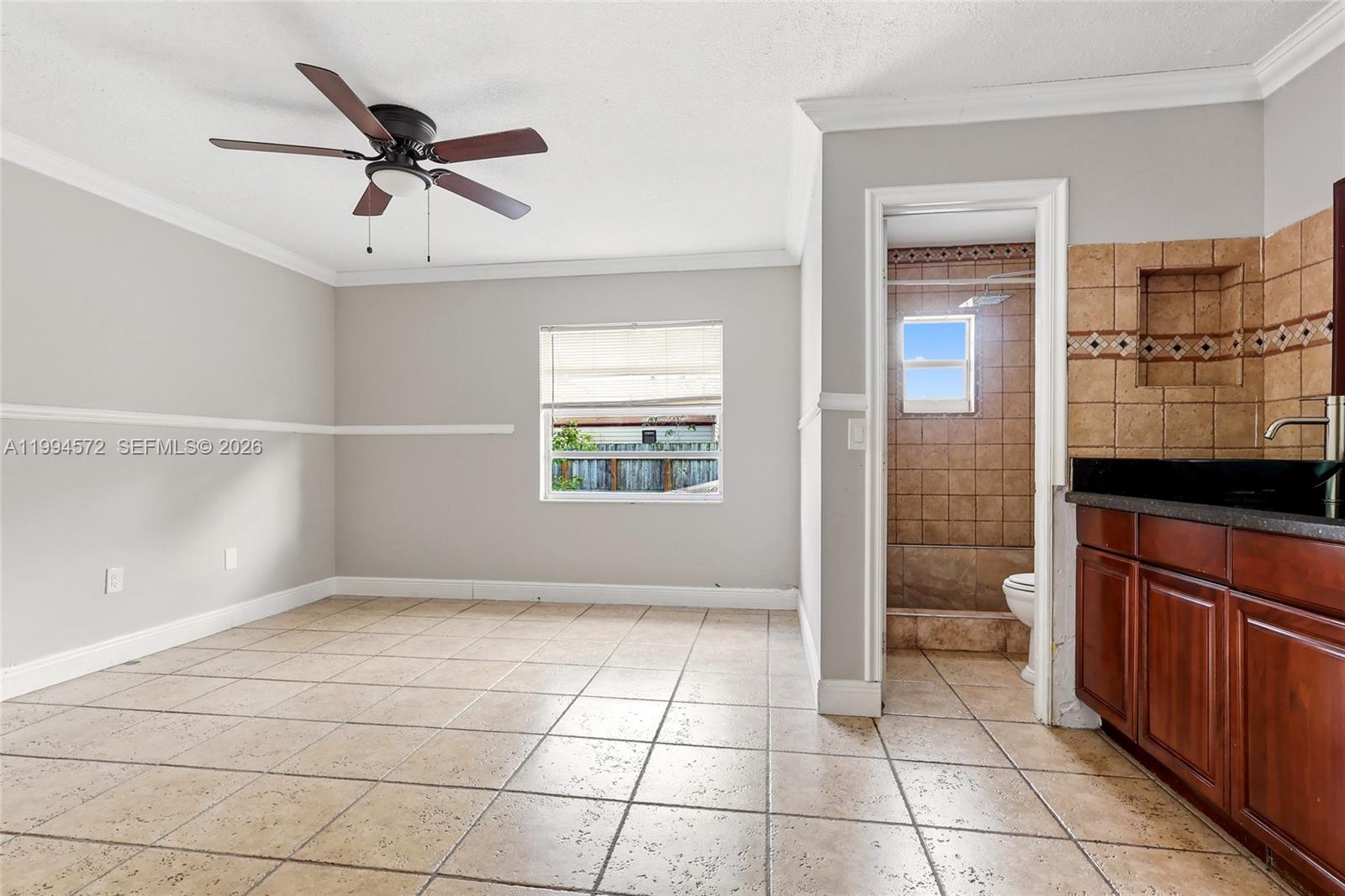 5730 Northwest 199th Street Hialeah, FL 33015 - Photo 13 of 33 a view of an empty room with a window