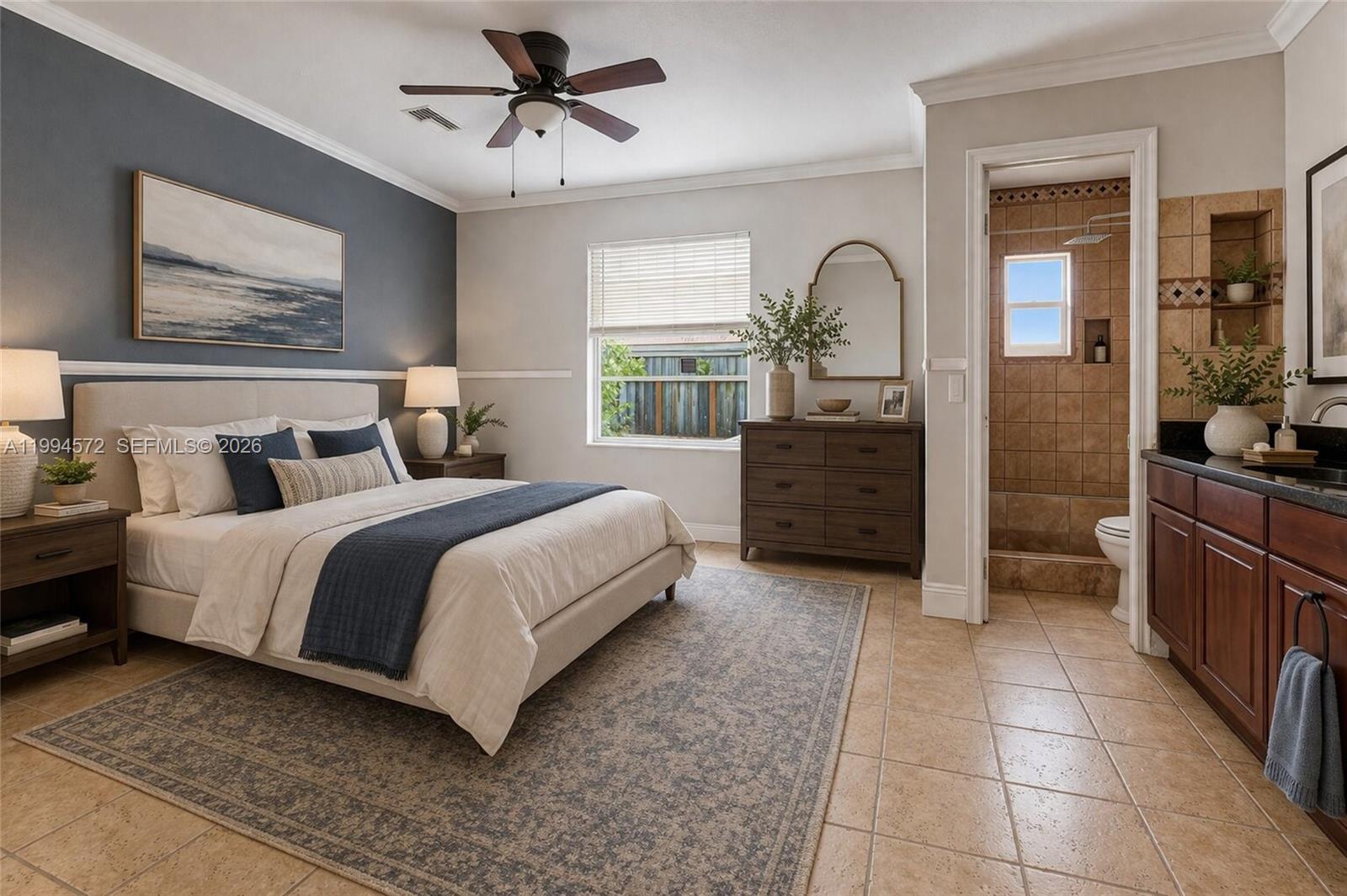 5730 Northwest 199th Street Hialeah, FL 33015 - Photo 18 of 33 a spacious bedroom with a bed a dresser and large window