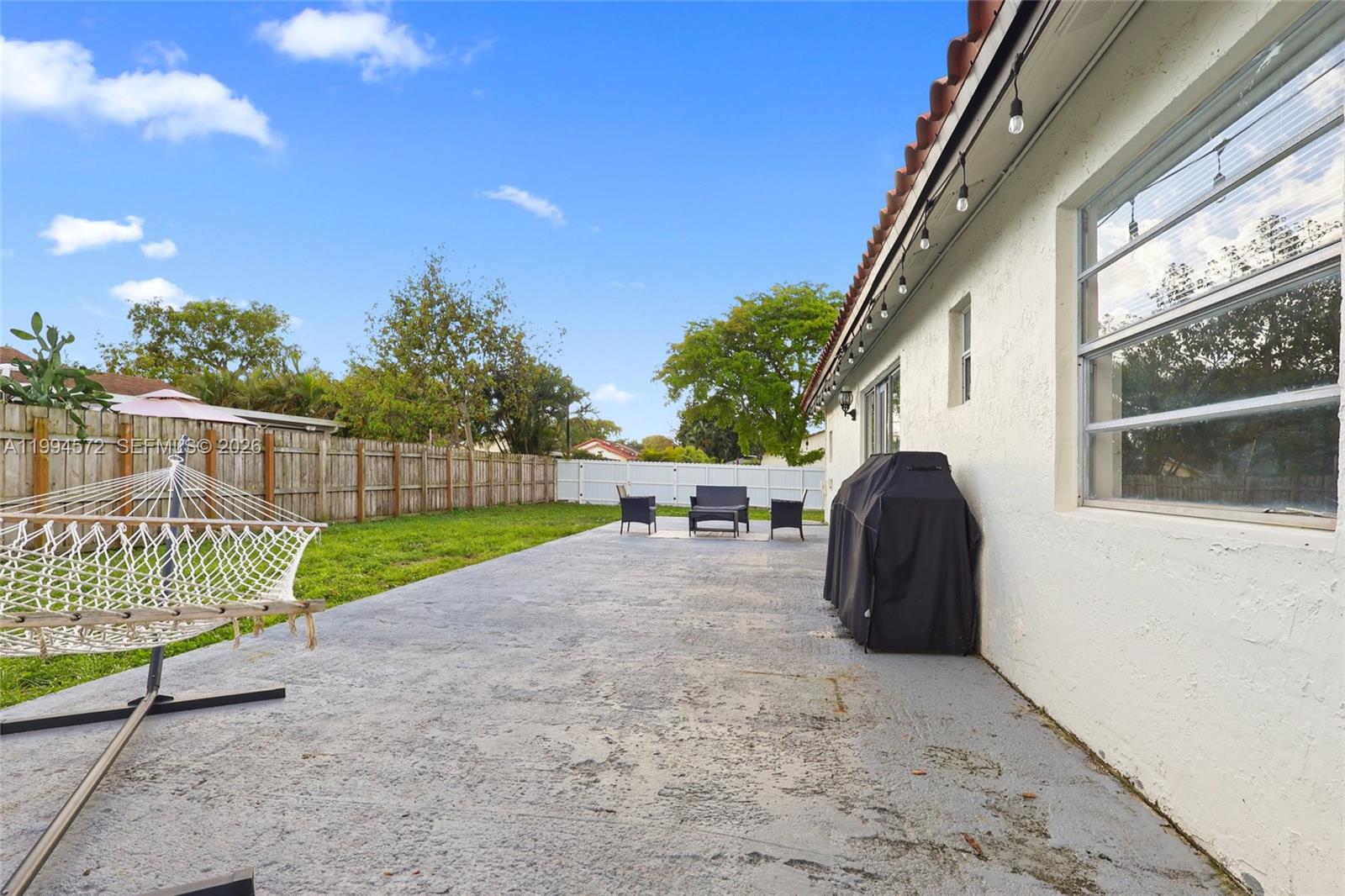 5730 Northwest 199th Street Hialeah, FL 33015 - Photo 30 of 33 a view of outdoor space and yard