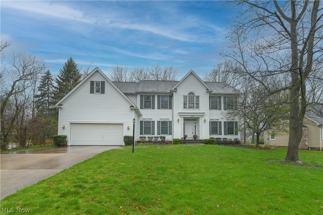 1688 Sheridan Road South Euclid, OH 44121 - Photo 1 of 48 View of front of home featuring a front lawn and a garage