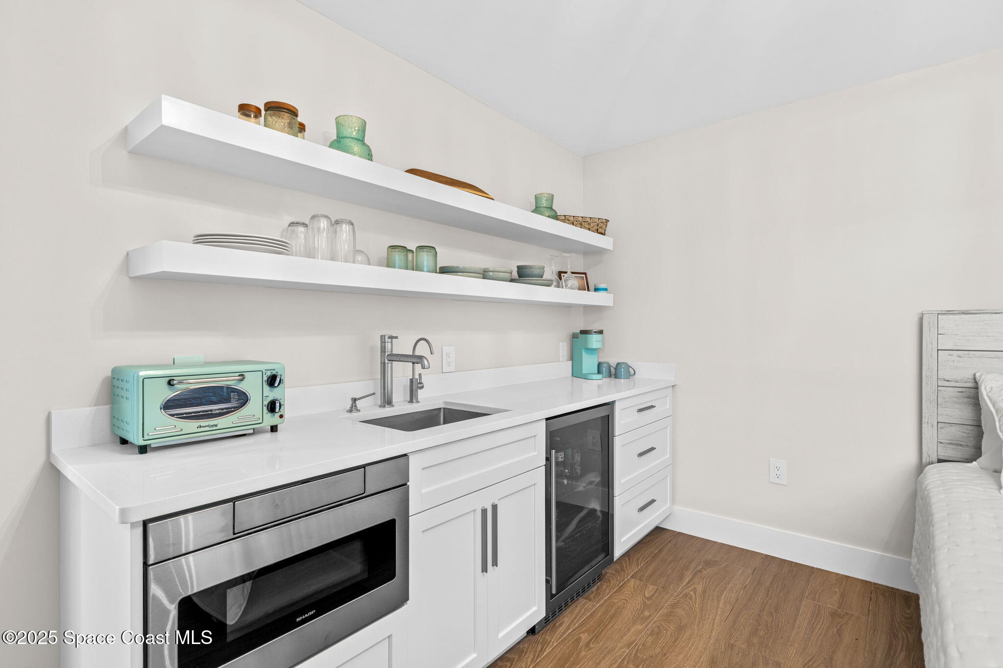 2021 South Orlando Avenue Cocoa Beach, FL 32931 - Photo 30 of 42 a utility room with sink dryer and washer