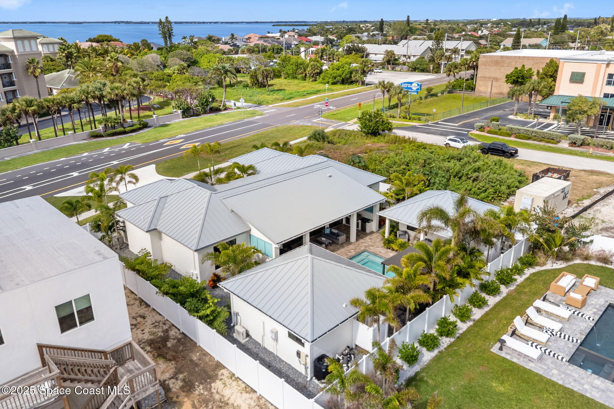 2021 South Orlando Avenue Cocoa Beach, FL 32931 - Photo 36 of 42 an aerial view of residential houses with outdoor space