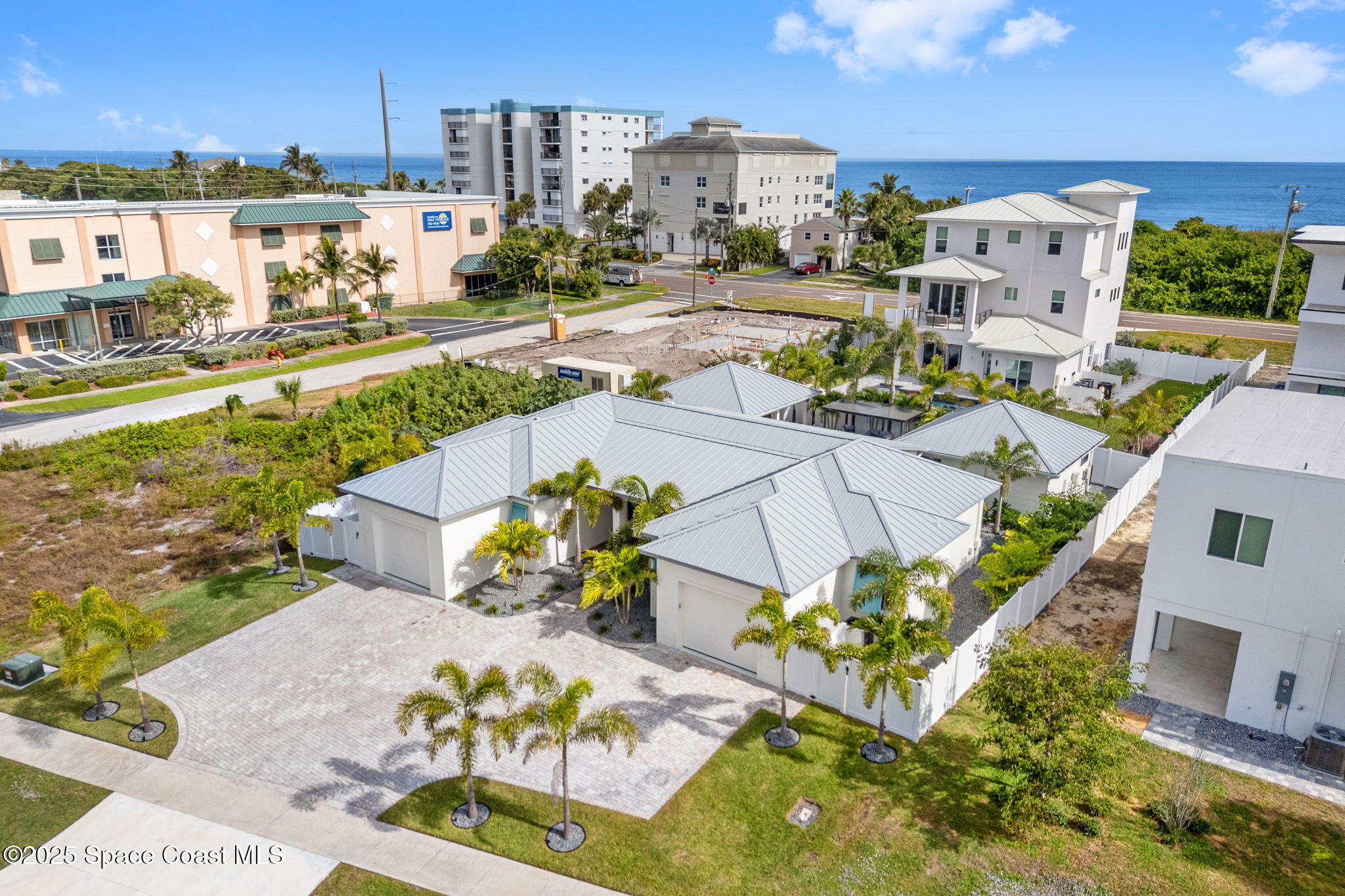 2021 South Orlando Avenue Cocoa Beach, FL 32931 - Photo 41 of 42 a view of a city with lawn chairs