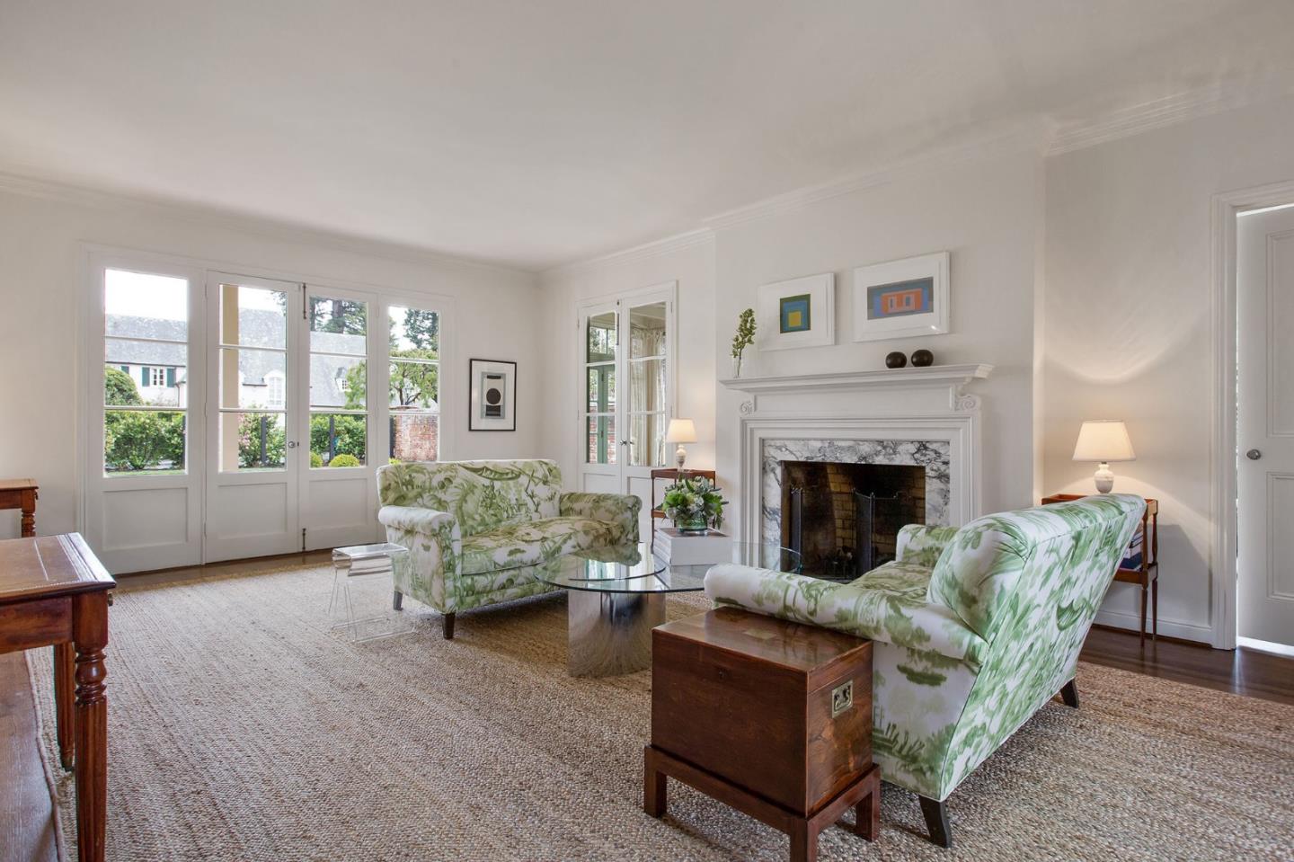 508 Roehampton Road Hillsborough, CA 94010 - Photo 12 of 50 a living room with furniture and a fireplace