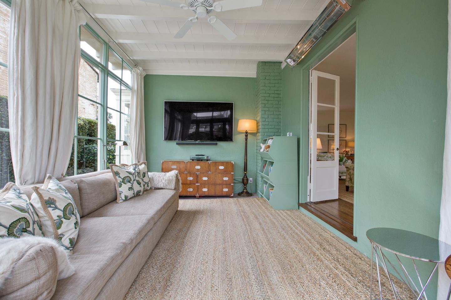 508 Roehampton Road Hillsborough, CA 94010 - Photo 16 of 50 a living room with furniture and a flat screen tv