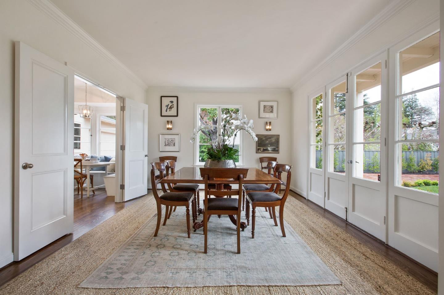 508 Roehampton Road Hillsborough, CA 94010 - Photo 19 of 50 a view of a dining room with furniture window and wooden floor