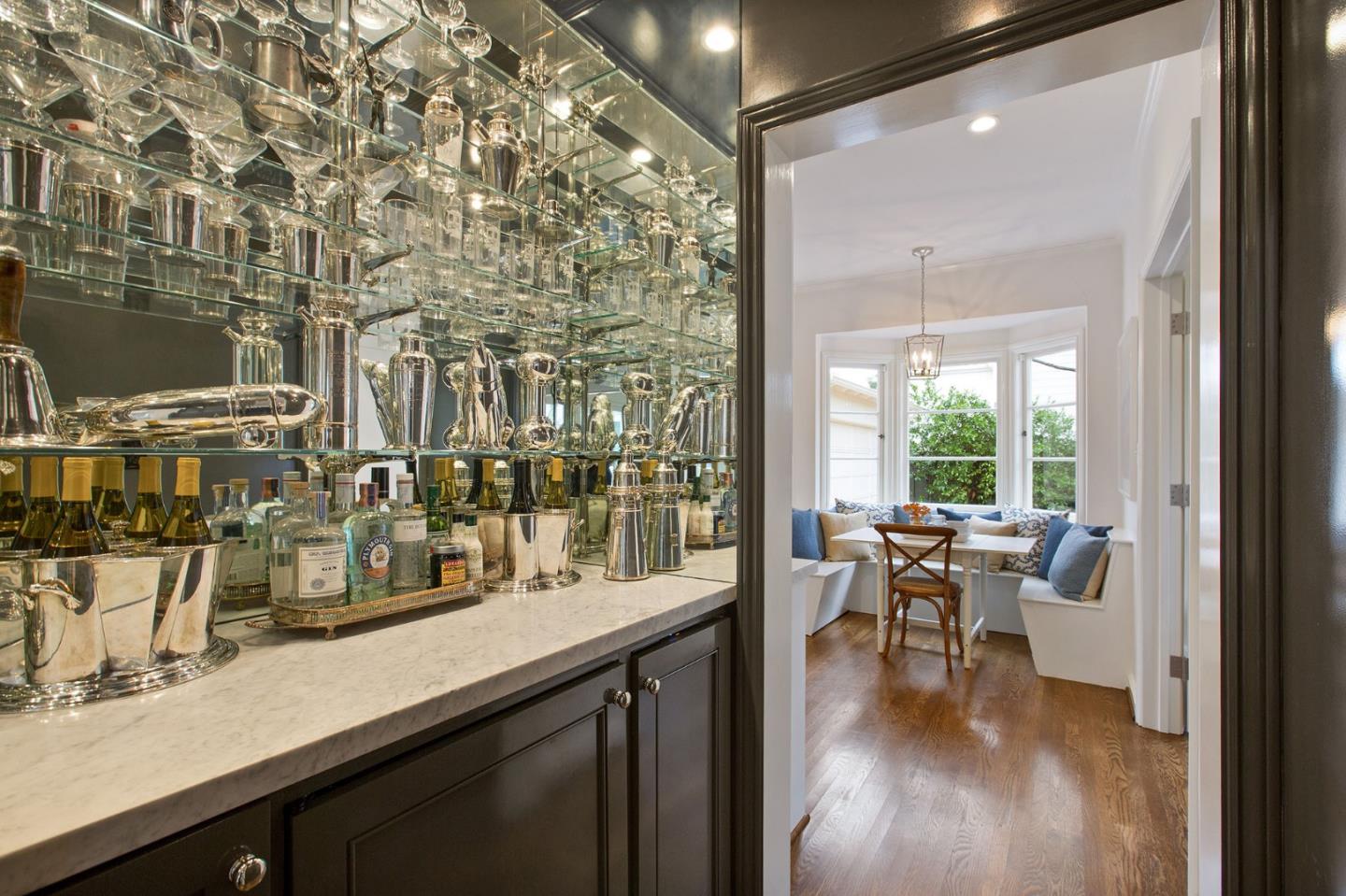 508 Roehampton Road Hillsborough, CA 94010 - Photo 29 of 50 a view of a dining room with furniture and wooden floor