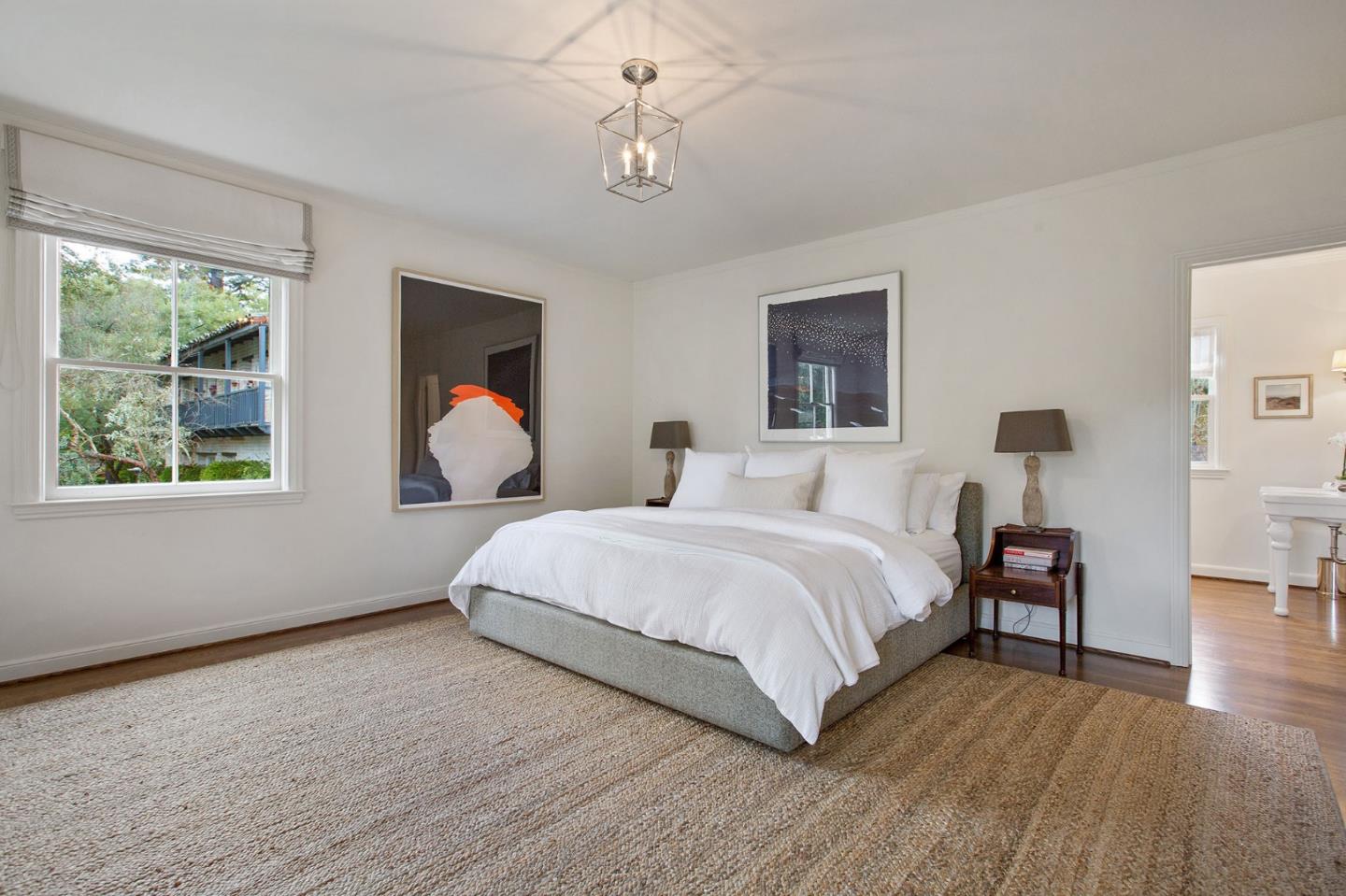 508 Roehampton Road Hillsborough, CA 94010 - Photo 32 of 50 a bedroom with a bed and a window