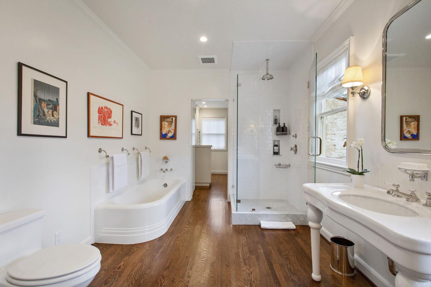 508 Roehampton Road Hillsborough, CA 94010 - Photo 38 of 50 a spacious bathroom with a bathtub shower sink vanity mirror and toilet