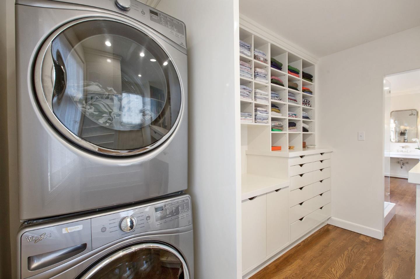 508 Roehampton Road Hillsborough, CA 94010 - Photo 39 of 50 a view of a bedroom with washer and dryer