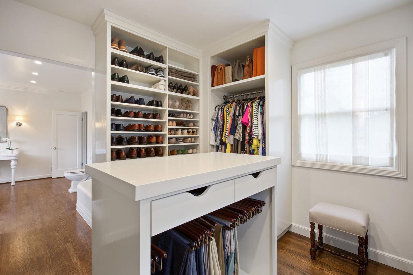 508 Roehampton Road Hillsborough, CA 94010 - Photo 40 of 50 a view of walk in closet with clothes and shoes