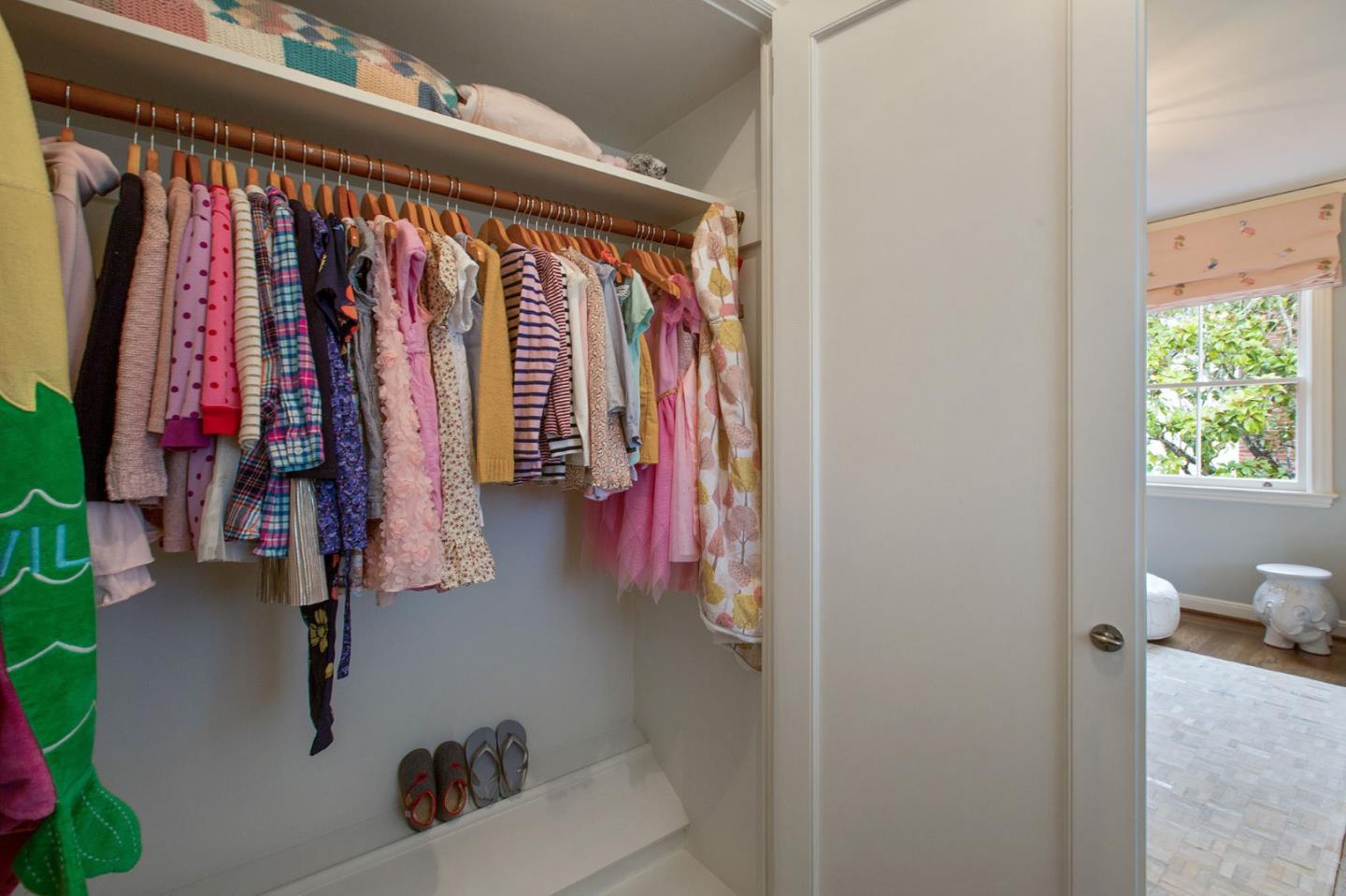 508 Roehampton Road Hillsborough, CA 94010 - Photo 45 of 50 a view of walk in closet with clothes and shoes