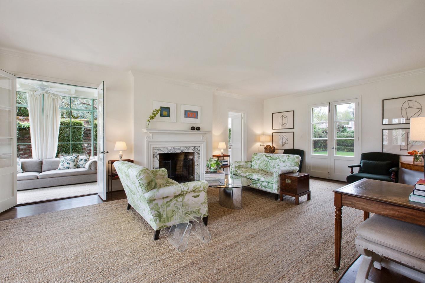 508 Roehampton Road Hillsborough, CA 94010 - Photo 10 of 50 a living room with furniture large window and a fireplace