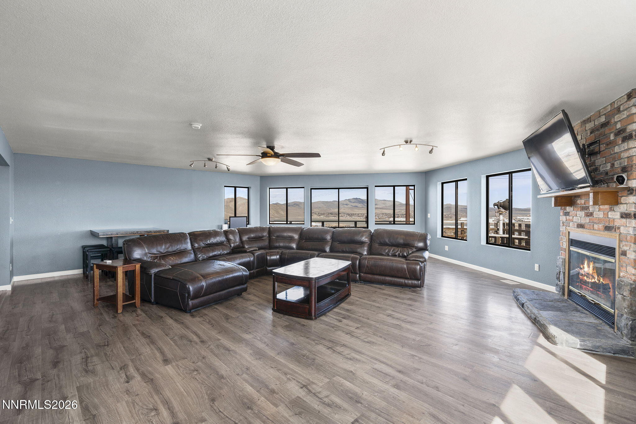 9906 North Virginia Street Reno, NV 89506 - Photo 4 of 36 a living room with furniture and a wooden floor