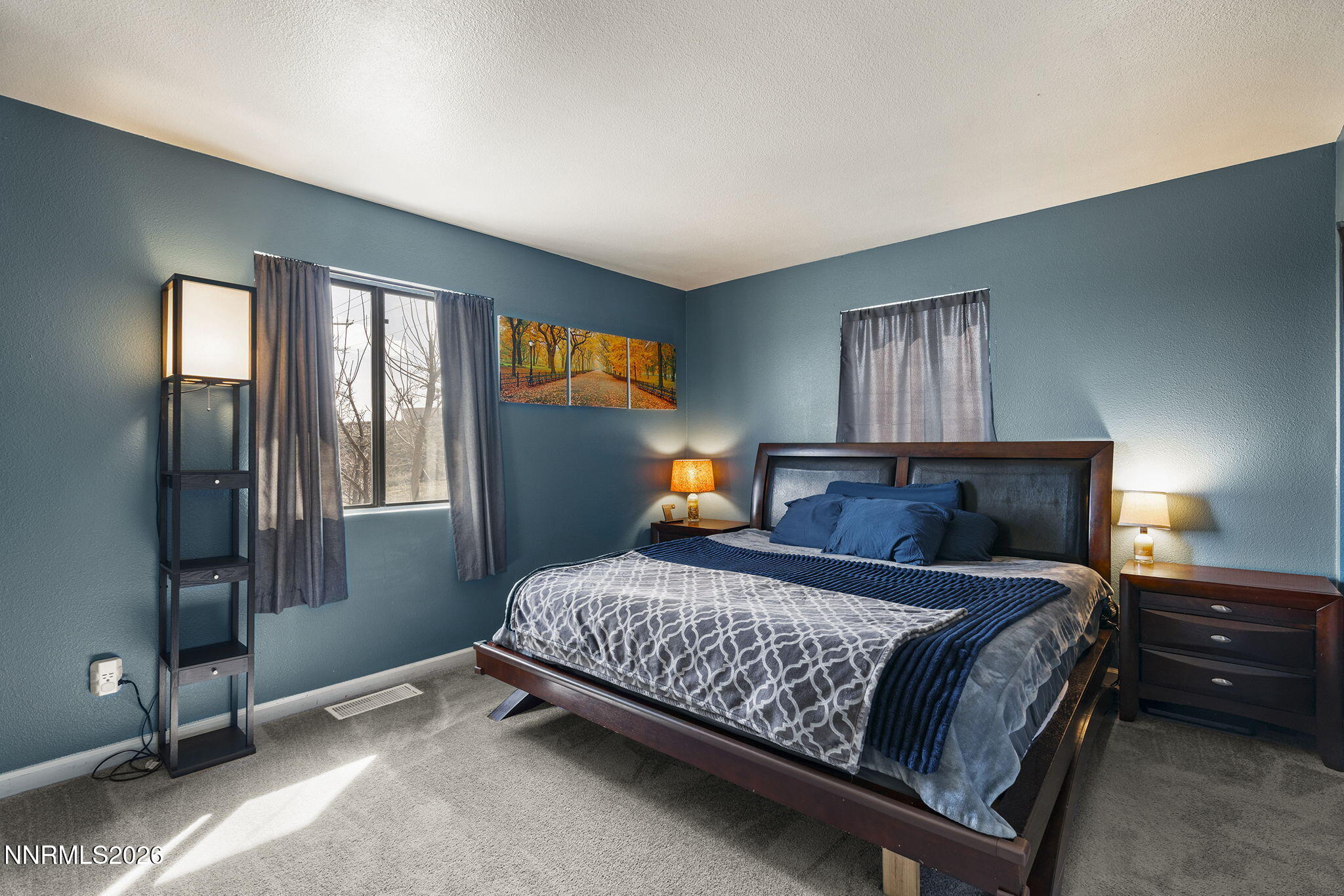 9906 North Virginia Street Reno, NV 89506 - Photo 10 of 36 a bedroom with a bed and window