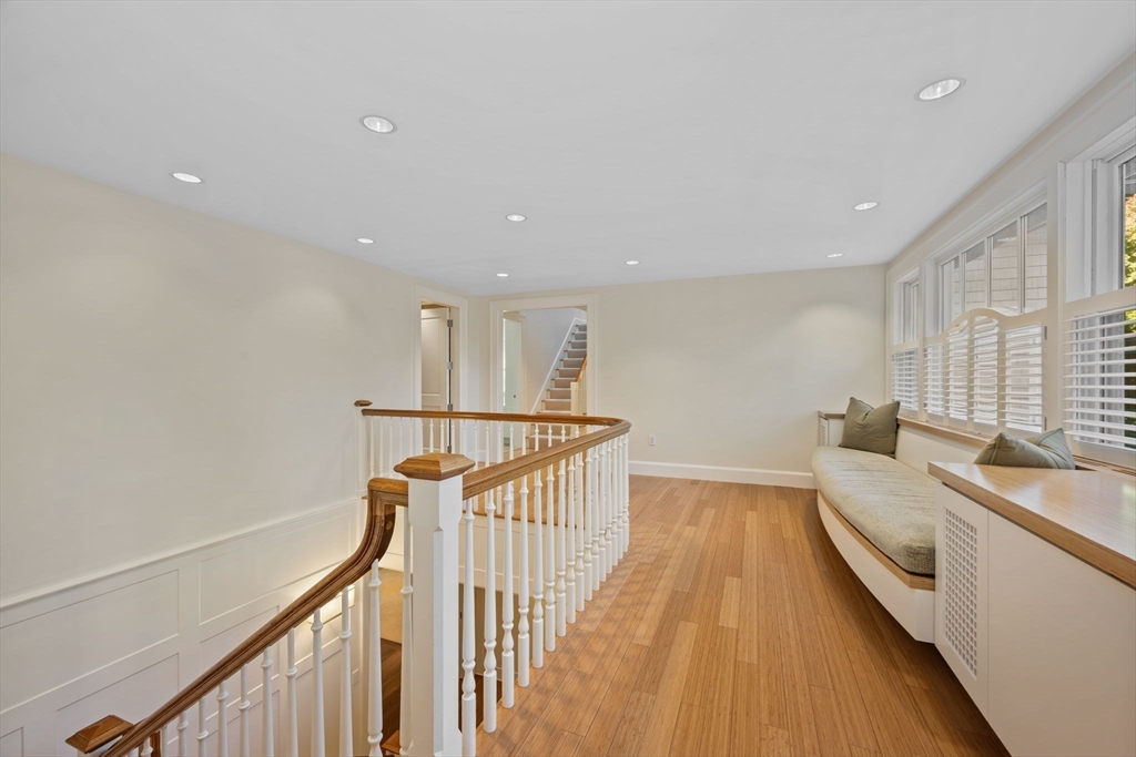 29 Merrill Road Newton, MA 02459 - Photo 19 of 42 a view of a hallway with stairs