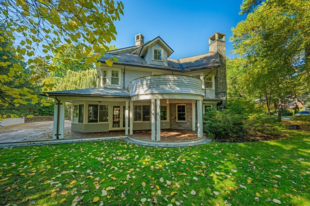 29 Merrill Road Newton, MA 02459 - Photo 2 of 42 a front view of a house with garden