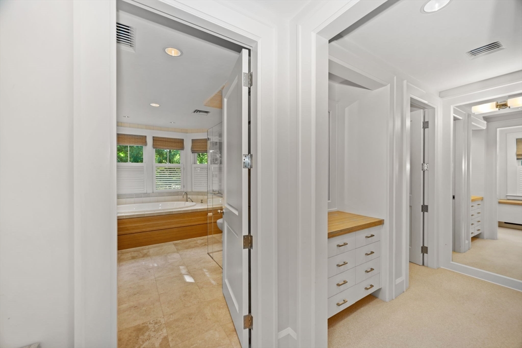 29 Merrill Road Newton, MA 02459 - Photo 22 of 42 a view of walk in closet and bathroom