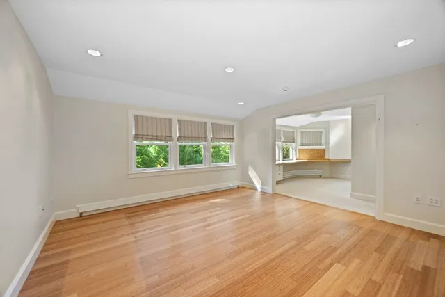 a bathroom with a toilet a sink and shower