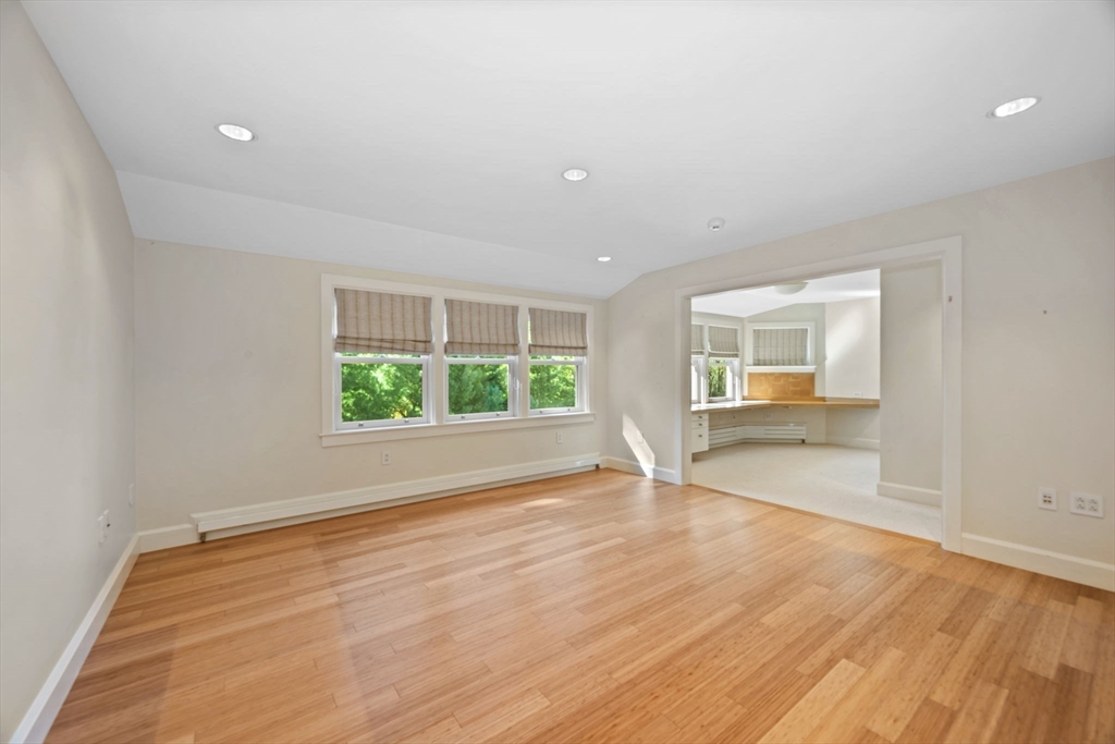 29 Merrill Road Newton, MA 02459 - Photo 26 of 42 wooden floor in an empty room with a window